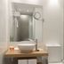 Petit Palace Plaza del Carmen Madrid bathroom with vessel sink, large mirror and glass shower