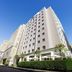 Hotel Jal City Kannai Yokohama in Yokohama, exterior of tall white hotel building under blue sky