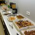 Hotel Bradomin Vilanova de Arousa breakfast buffet with pastries, fruit, cereal and coffee station