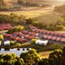 Tall Timbers Tasmania in Smithton, aerial view of red-roofed lodge buildings amid lush greenery
