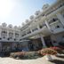 Sammy Dalat Hotel in Dalat, a grand courtyard hotel facade with balconies and flower beds