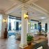 Sari Pacifica Resort & Spa on Redang Island lobby with white columns, tiled floors, and seating area