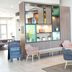 Holiday Inn & Suites Phoenix Airport lobby seating area with colorful display shelves in Phoenix