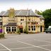 Premier Inn Leicester North West exterior in Leicester with parking lot and traditional stone facade
