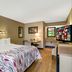 Red Roof Inn Asheville - Biltmore West room with king bed, desk, and TV in Asheville
