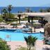 Time Coral Nuweiba Resort in Nuweiba with pool, palm trees, and Red Sea views