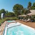 Concept Village Piccola Gardiola in San Felice del Benaco, pool deck with loungers, umbrellas and hot tub