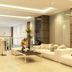 Hanoi Crystal Hotel lobby in Hanoi with white sofas, coffee table, and mezzanine view