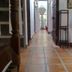Some Days Of Silence Resort And Spa in Dong Hai, tiled hallway with open doorway and curtains