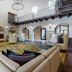 Omni Rancho Las Palmas Resort & Spa lobby with high ceilings, arches, seating area and mezzanine in Rancho Mirage