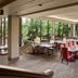 Sheraton Suites Akron Cuyahoga Falls dining room with floor-to-ceiling windows and red chairs
