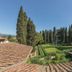 Villa Casagrande Resort E Spa in Figline Valdarno with terracotta roofs, manicured gardens and cypress trees