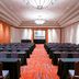 Sheraton Pilar Hotel & Convention Center in Pilar ballroom with rows of conference tables and chairs