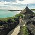 Paradise Cove Boutique Hotel in Cap Malheureux with a thatched seaside gazebo and turquoise bay