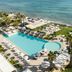 Canne Bianche Lifestyle Hotel, Torre Canne: seaside pool, sun loungers, and lawn beside the Adriatic Sea