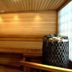Hotelli Emilia in Hämeenlinna sauna with wooden benches and heater