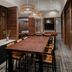 Cleveland Marriott East conference room in Warrensville Heights with long wood table and modern lighting