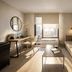 Red Roof Plus+ Vancouver Airport in Richmond: modern guest room with desk, sofa, and city view