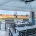 Candlewood Suites Topeka West By IHG patio with grills, dining table and umbrella seating in Topeka