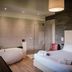 Antico Borgo di Sutri in Sutri guest room with freestanding tub, walk-in shower and bed