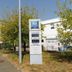 Ibis Budget Rochefort exterior with roadside sign and white hotel building in Rochefort