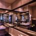 Hôtel des Beaux-Arts Toulouse bathroom with glass shower, sink and mirrored vanity