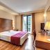 Luna Hotel Motel Lago Maggiore Arona room with double bed, desk and balcony door in Oleggio Castello