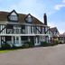 Marygreen Manor Hotel in Brentwood, traditional Tudor-style hotel exterior with pitched roof and landscaped grounds