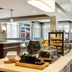 Hilton Garden Inn Dulles North Ashburn breakfast buffet with pastries, fruit, and dining area