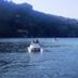 Douro Hotel Porto Antigo in Cinfães with boats on the river and wooded hills beyond