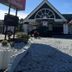 Econo Lodge Ormond Beach North - Daytona exterior with gravel driveway and peaked entrance in Ormond Beach