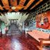Hacienda de las Flores in San Miguel de Allende lobby with stone walls, wood beams and central staircase