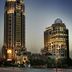 Arjaan by Rotana - Dubai Media City in Dubai, with twin illuminated towers at dusk