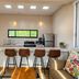 Hacienda de las Flores in San Miguel de Allende: bright suite with kitchen bar, stools, and sofa