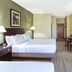 Country Inn & Suites by Radisson, Benton Harbor-St guest room with two beds, TV, microwave and desk
