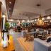 Best Western Premier Bangtao Beach Resort & Spa lobby lounge in Choeng Thale with sofas, pendant light and bar