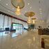 Xinji Garden Hotel in Nanchang lobby with chandeliers, polished marble floors and tall windows