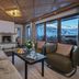 Hotel Zurserhof in Zürs lounge with fireplace and alpine mountain views