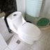 Shanghai Huijia Business Hotel in Shanghai bathroom with white toilet and shower area