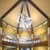 Desert Diamond Casino Tucson lobby with a circular seating area and starburst chandelier