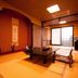 Motoyu No Yado Kurodaya in Beppu: traditional tatami room with low table and floor cushions