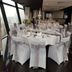 The Cube Hotel Birmingham dining room with round banquet tables and city views through angled windows