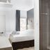Lille City Hotel, Lille: compact guest room with double bed, desk, wall-mounted TV and shower room