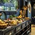 Breakfast buffet at Hôtel Mercure La Roche Sur Yon Centre in La Roche-sur-Yon with neon "Good vibes" wall