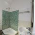 Hotel Harasar Haveli in Bikaner bathroom with shower, toilet, and bathtub