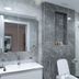 Plaza Athenee Hotel Kuwait City bathroom with walk-in shower, vanity, and toilet