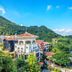 Hakka Park International Hotel in Meizhou set amid lush green hills and landscaped grounds