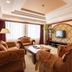 Grand View International Hotel, Liaoyang lounge with plush seating and wall-mounted TV