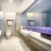 The Greenway Hotel Xiamen bathroom with glass shower, toilet and long vanity in Xiamen