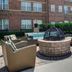 Residence Inn by Marriott Cleveland-Beachwood courtyard fire pit seating area outside the brick hotel